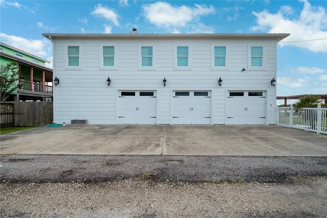 a view of a balcony with seating space