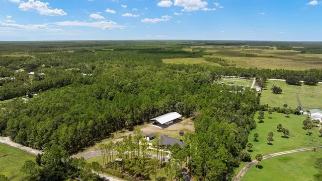 a outdoor dining space with furniture and garden view