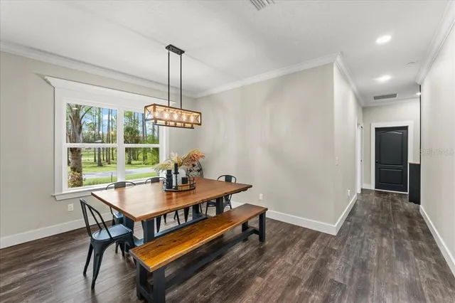 a view of a town with mountains in the background