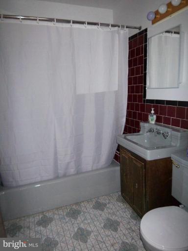 7613 Sparrows Point Boulevard Sparrows Point, MD 21219 - Photo 15 of 18 Hall Full Bath
