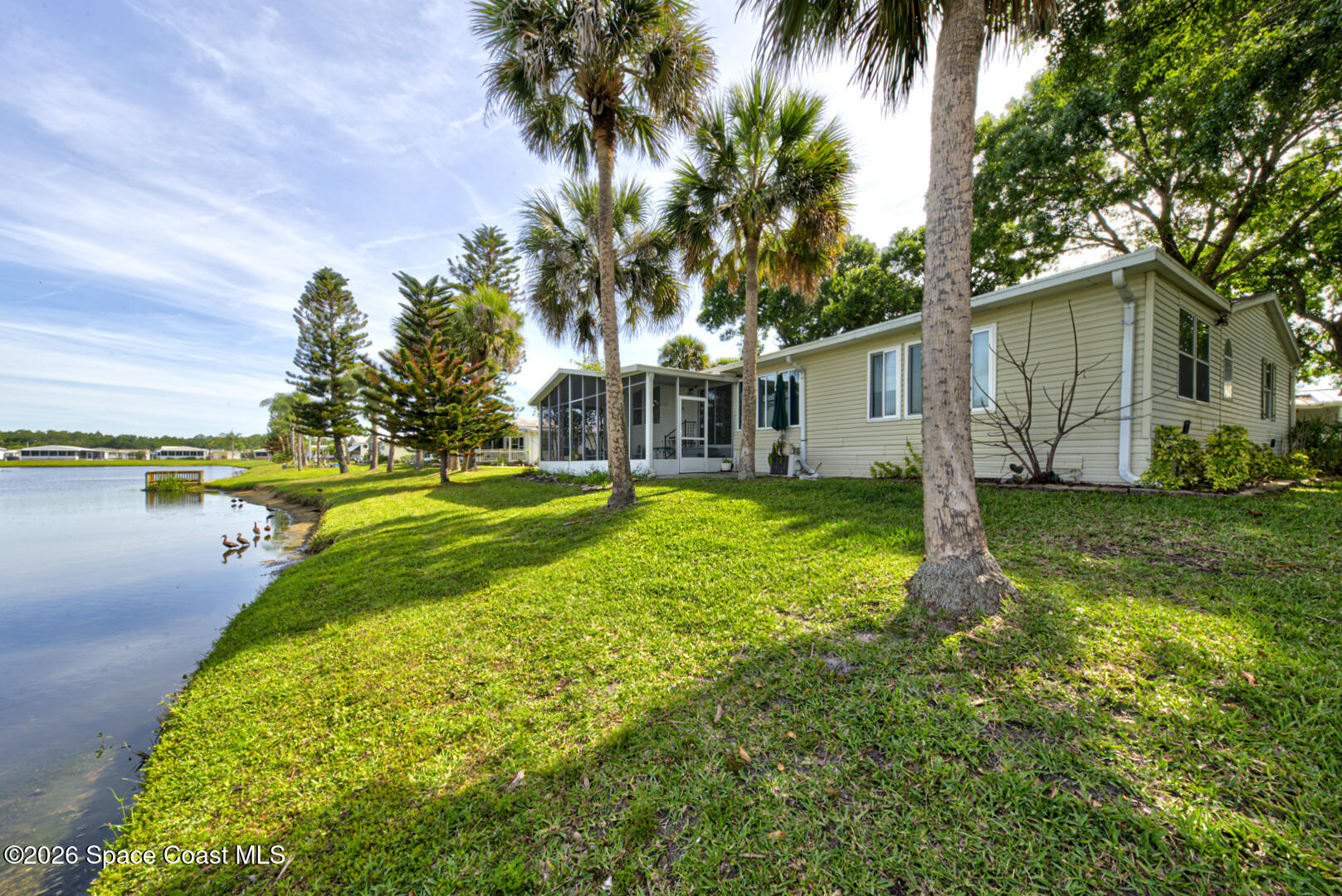 176 Woodsmill Boulevard, Unit 177 Cocoa, FL 32926 - Photo 52 of 63 50 back of house right