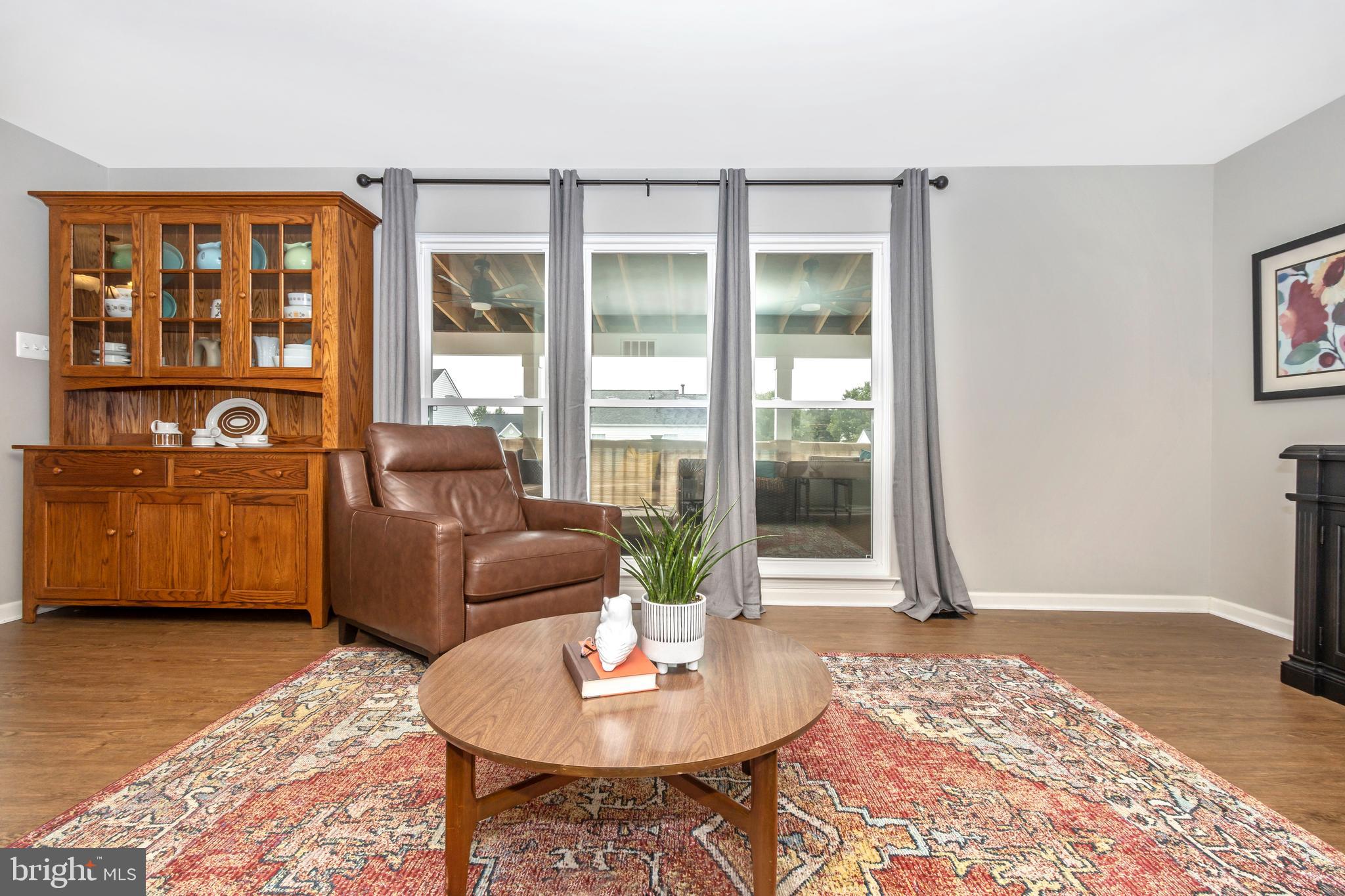 1408 Crossbow Road Mount Airy, MD 21771 - Photo 12 of 52 Large windows bring nature in this cozy room