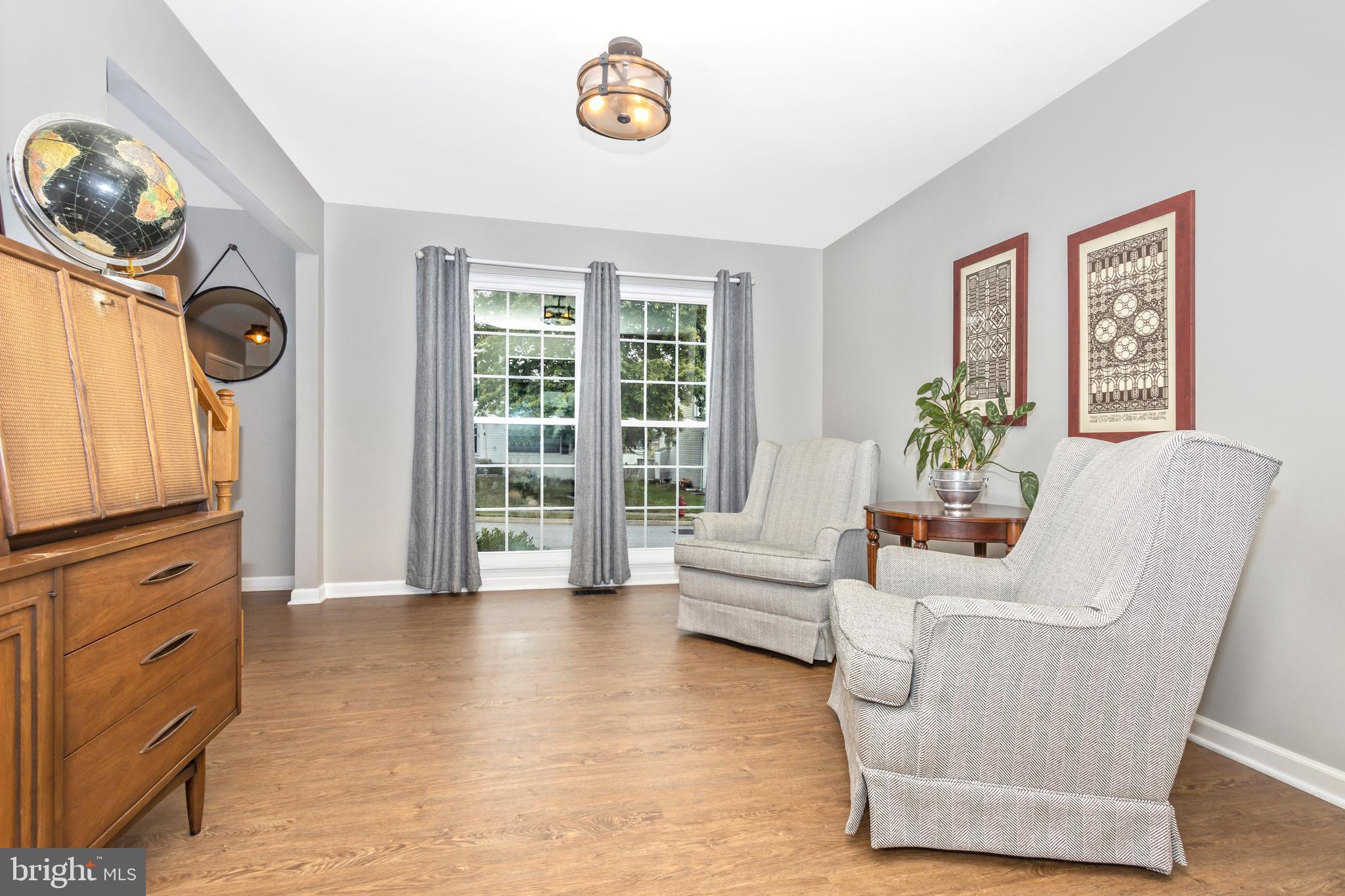 1408 Crossbow Road Mount Airy, MD 21771 - Photo 14 of 52 Invite your friends to chat in your living room.