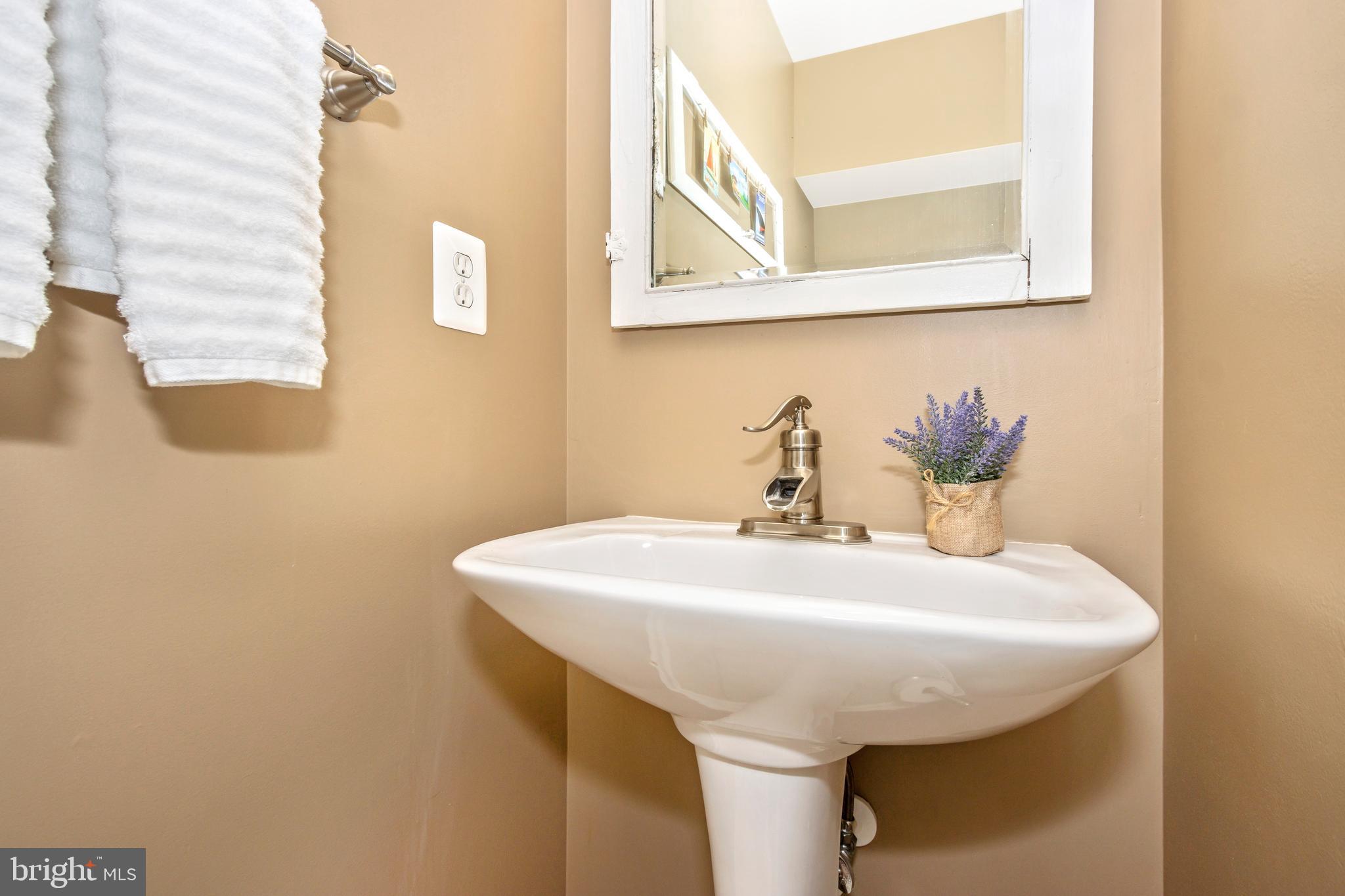 1408 Crossbow Road Mount Airy, MD 21771 - Photo 16 of 52 Main level half bath. Love this faucet!