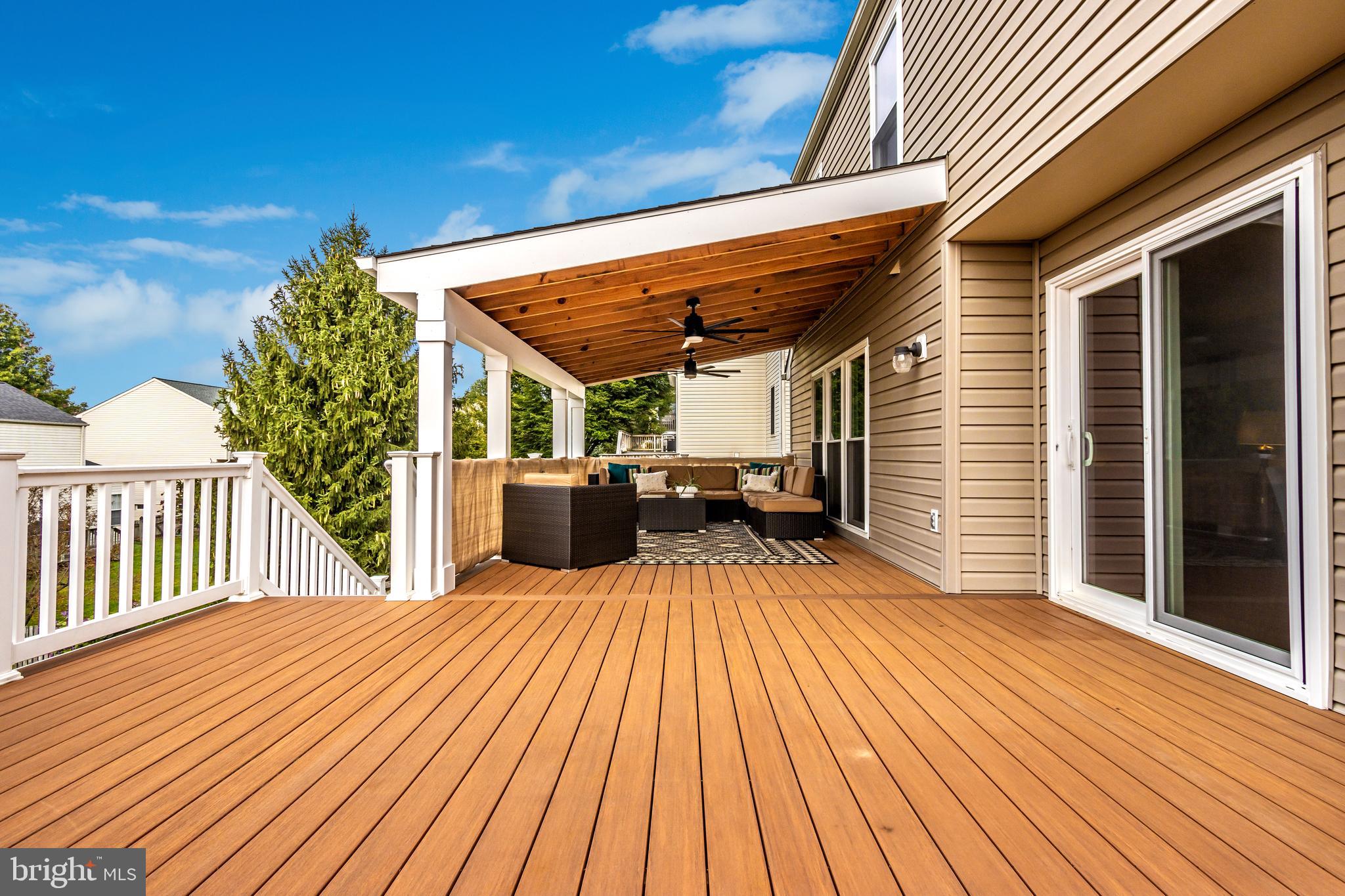 1408 Crossbow Road Mount Airy, MD 21771 - Photo 19 of 52 Love the 20x12 roof covered deck lounge area!
