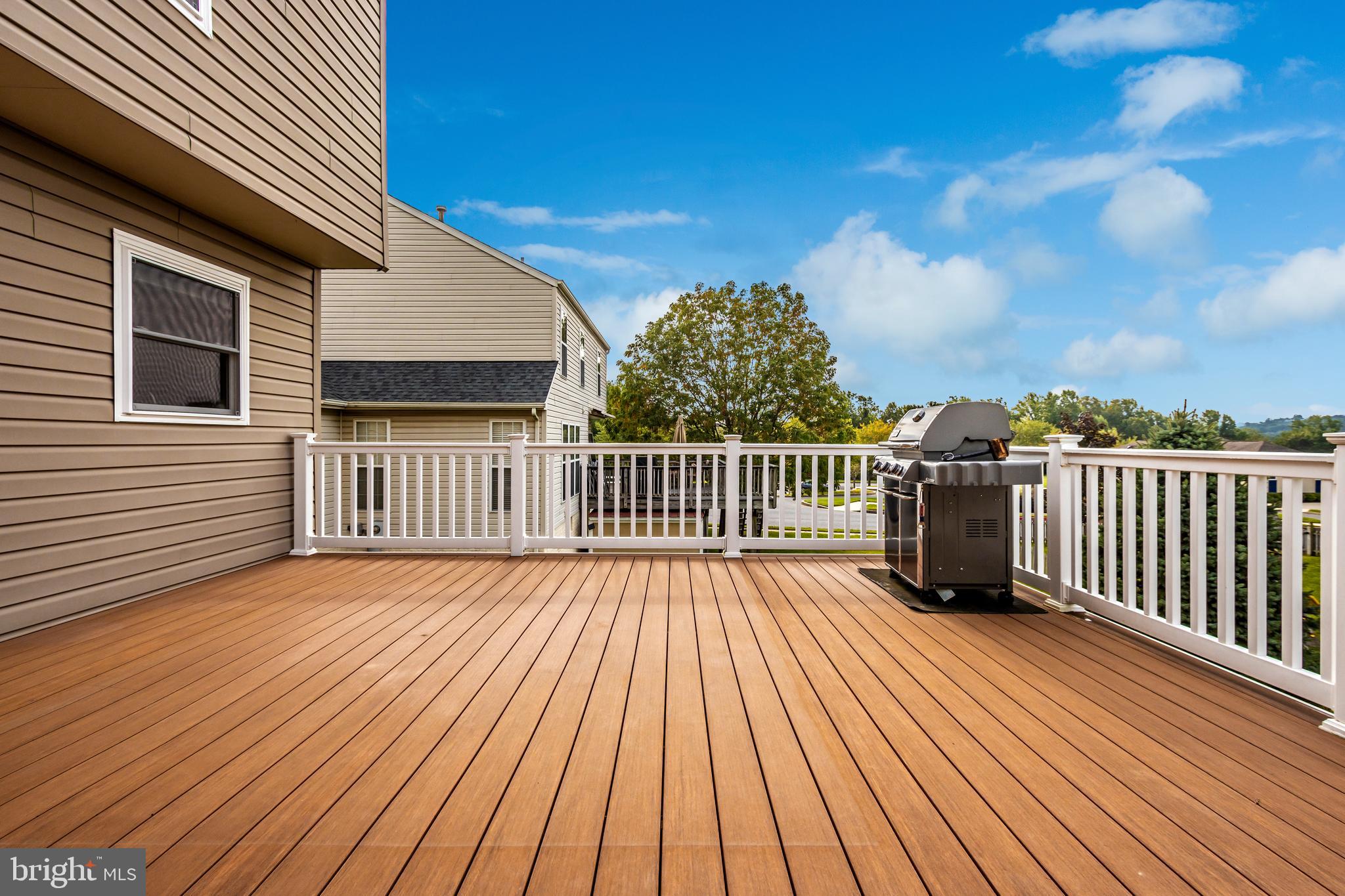 1408 Crossbow Road Mount Airy, MD 21771 - Photo 20 of 52 Timber Teck deck extends the length of the home!