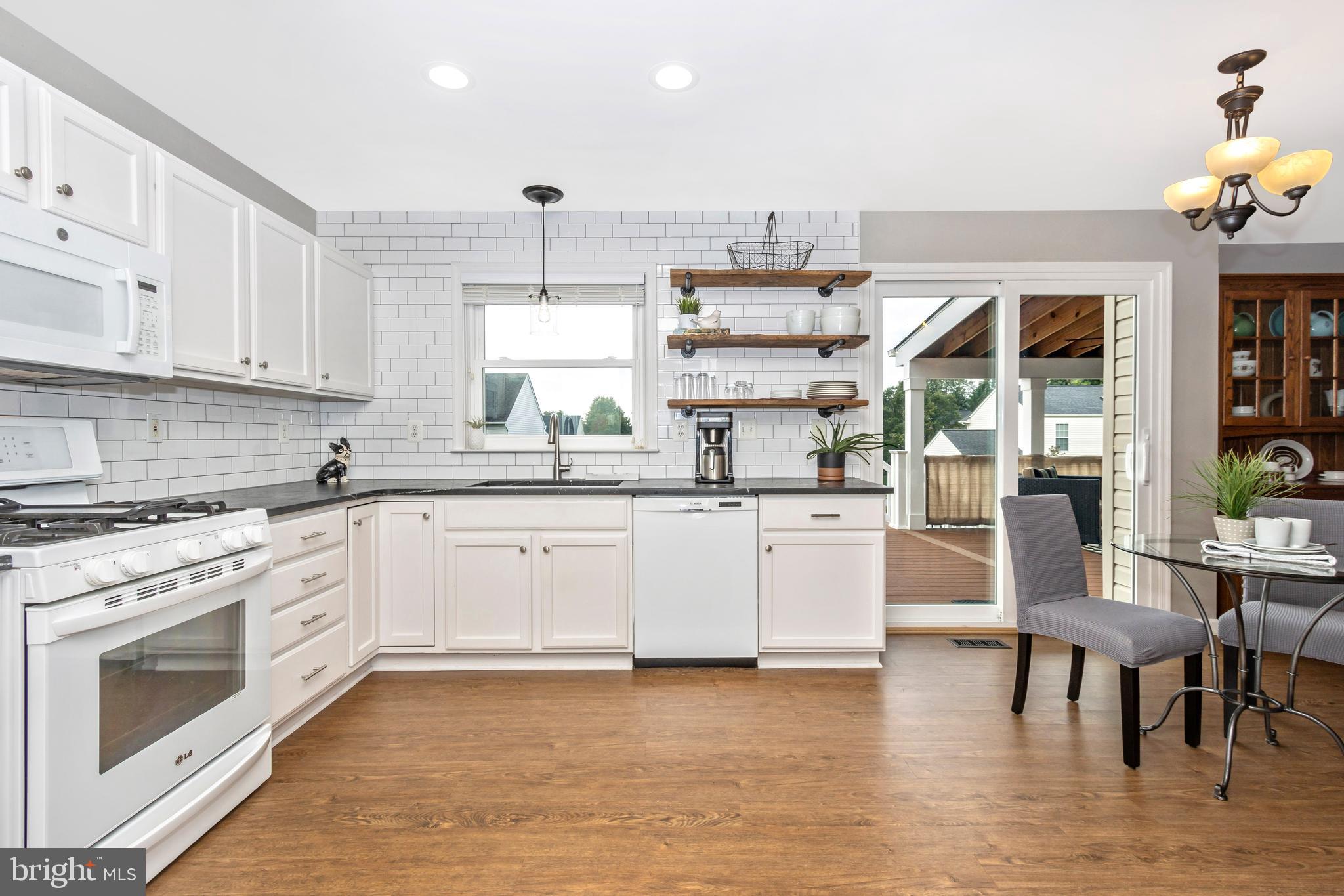 1408 Crossbow Road Mount Airy, MD 21771 - Photo 4 of 52 You'll love entertaining flow from kitchen to deck