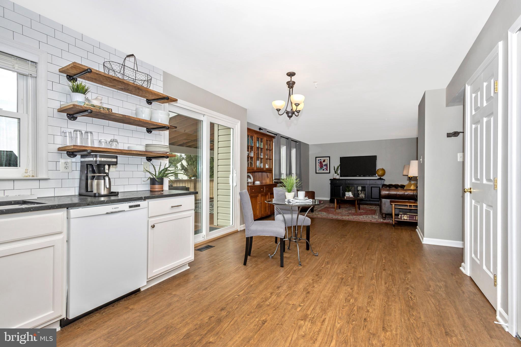 1408 Crossbow Road Mount Airy, MD 21771 - Photo 8 of 52 Beautiful LVP flooring throughout the main level!