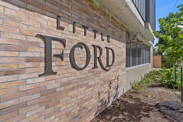 a view of a door with wooden wall