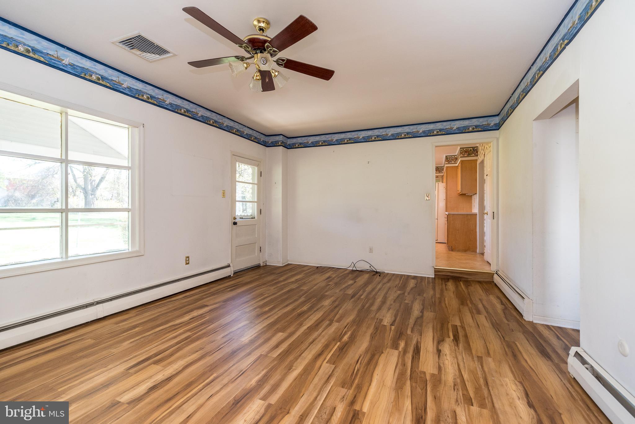67 Pine Avenue Richboro, PA 18954 - Photo 32 of 59 Family room and entry to the sunporch