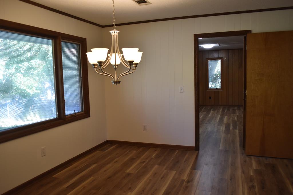 959 Pleasant Valley Road Murphy, NC 28906 - Photo 12 of 18 a view of a room with wooden floor and windows