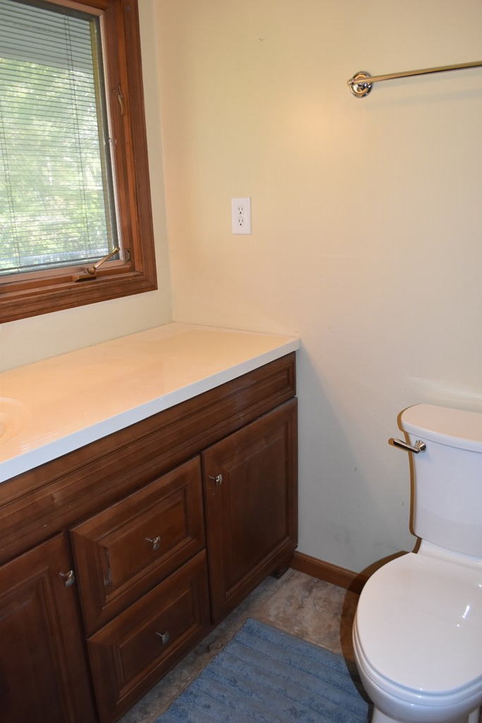 959 Pleasant Valley Road Murphy, NC 28906 - Photo 18 of 18 a bathroom with a sink a toilet and a window