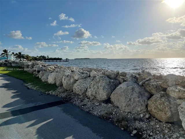 a view of a balcony with an ocean view