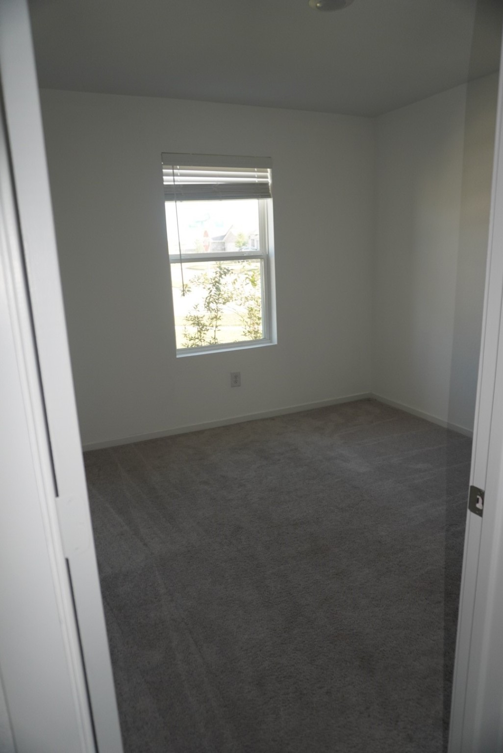 16803 Great Stable Way Hockley, TX 77447 - Photo 23 of 29 an empty room with a window