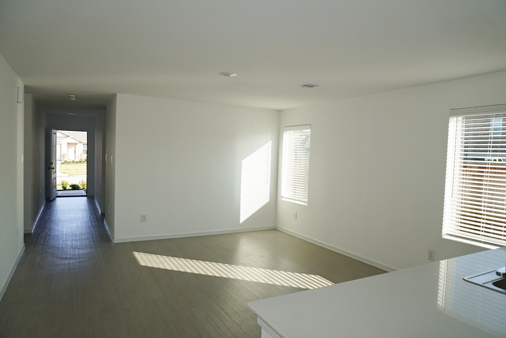 16803 Great Stable Way Hockley, TX 77447 - Photo 7 of 29 an empty room with wooden floor and windows