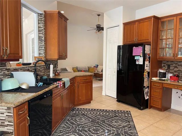 a bathroom with a sink a mirror and a toilet
