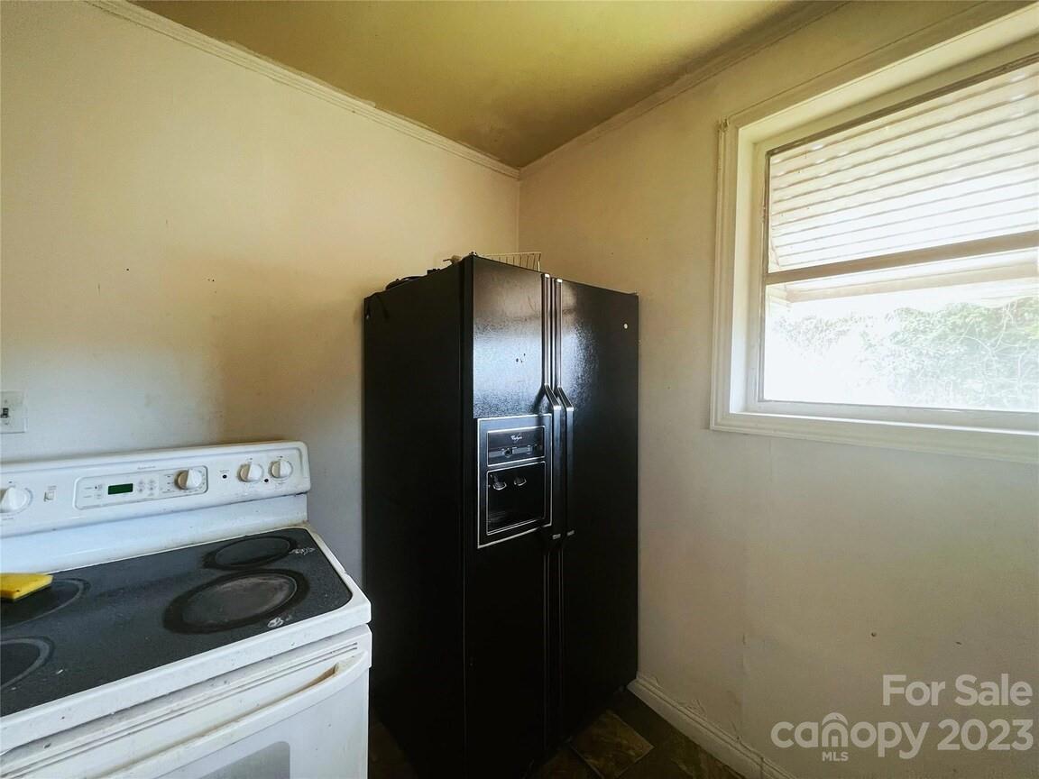 22 Broad Street Great Falls, SC 29055 - Photo 6 of 8 a utility room with dryer and washer