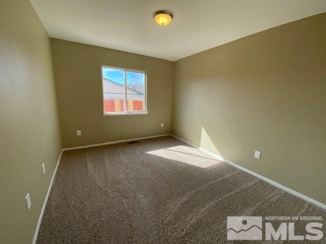 18020 Hazelnut Drive Reno, NV 89508 - Photo 15 of 19 an empty room with windows