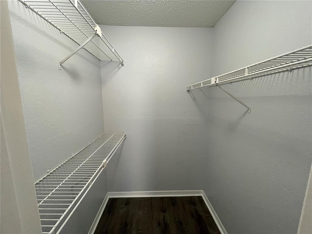 5128 Conroy Road, Unit 13 Orlando, FL 32811 - Photo 14 of 25 a view of small space with racks on the wall