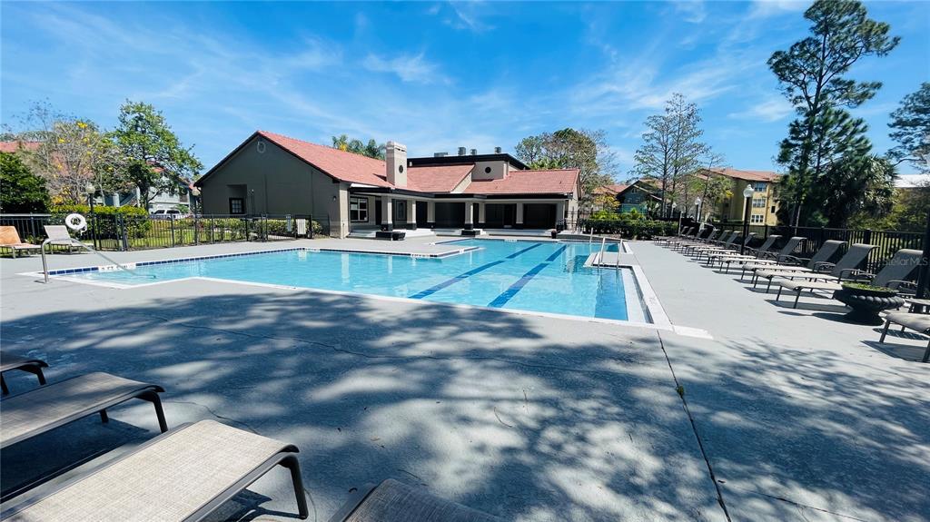 5128 Conroy Road, Unit 13 Orlando, FL 32811 - Photo 18 of 25 a view of a house with swimming pool