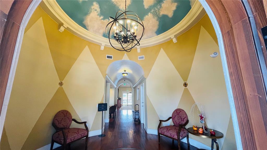 5128 Conroy Road, Unit 13 Orlando, FL 32811 - Photo 25 of 25 workspace with wooden floor windows and chair