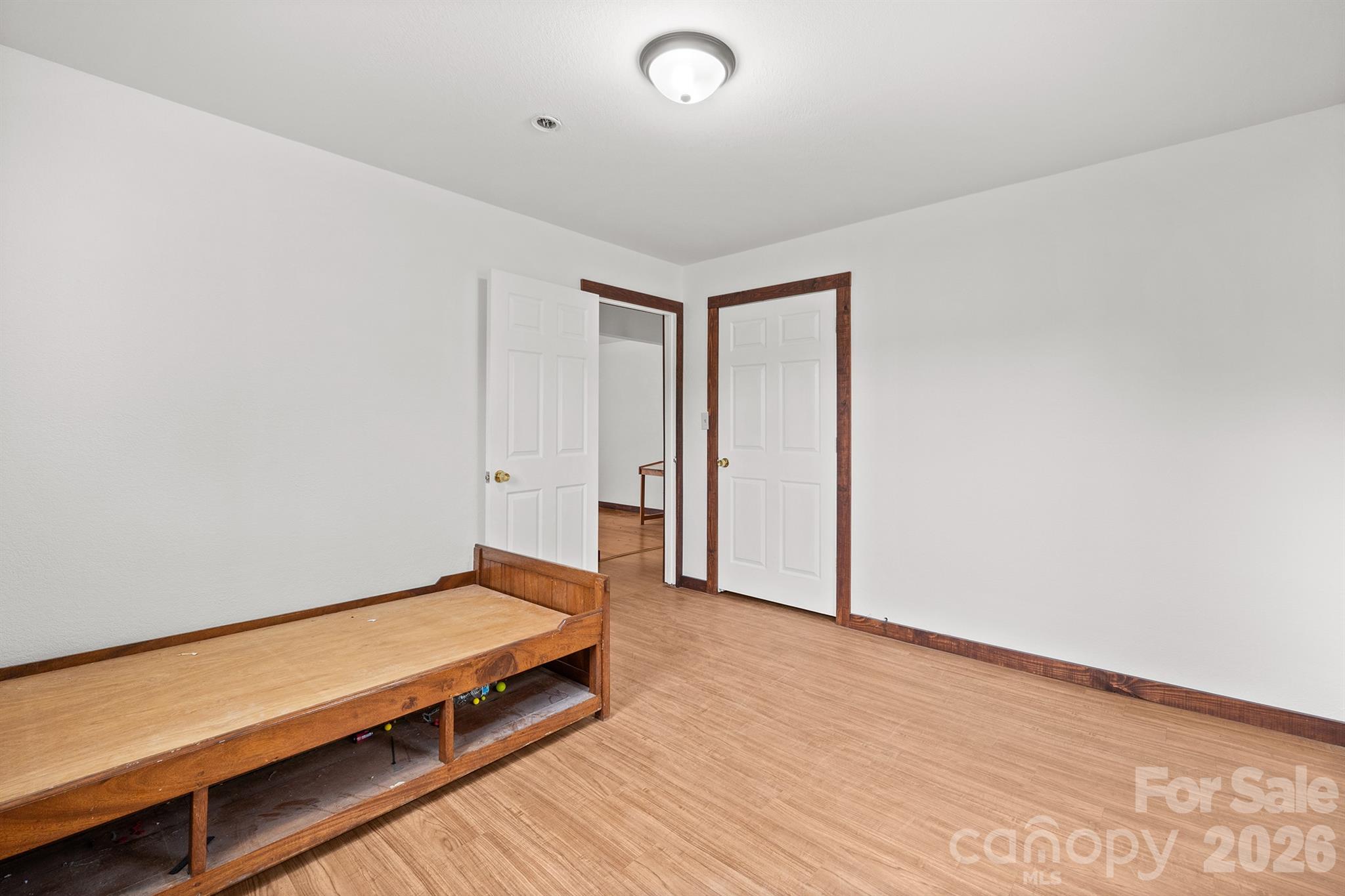 7400 Corn Hill Road Connelly Springs, NC 28612 - Photo 28 of 41 an empty room with wooden floor