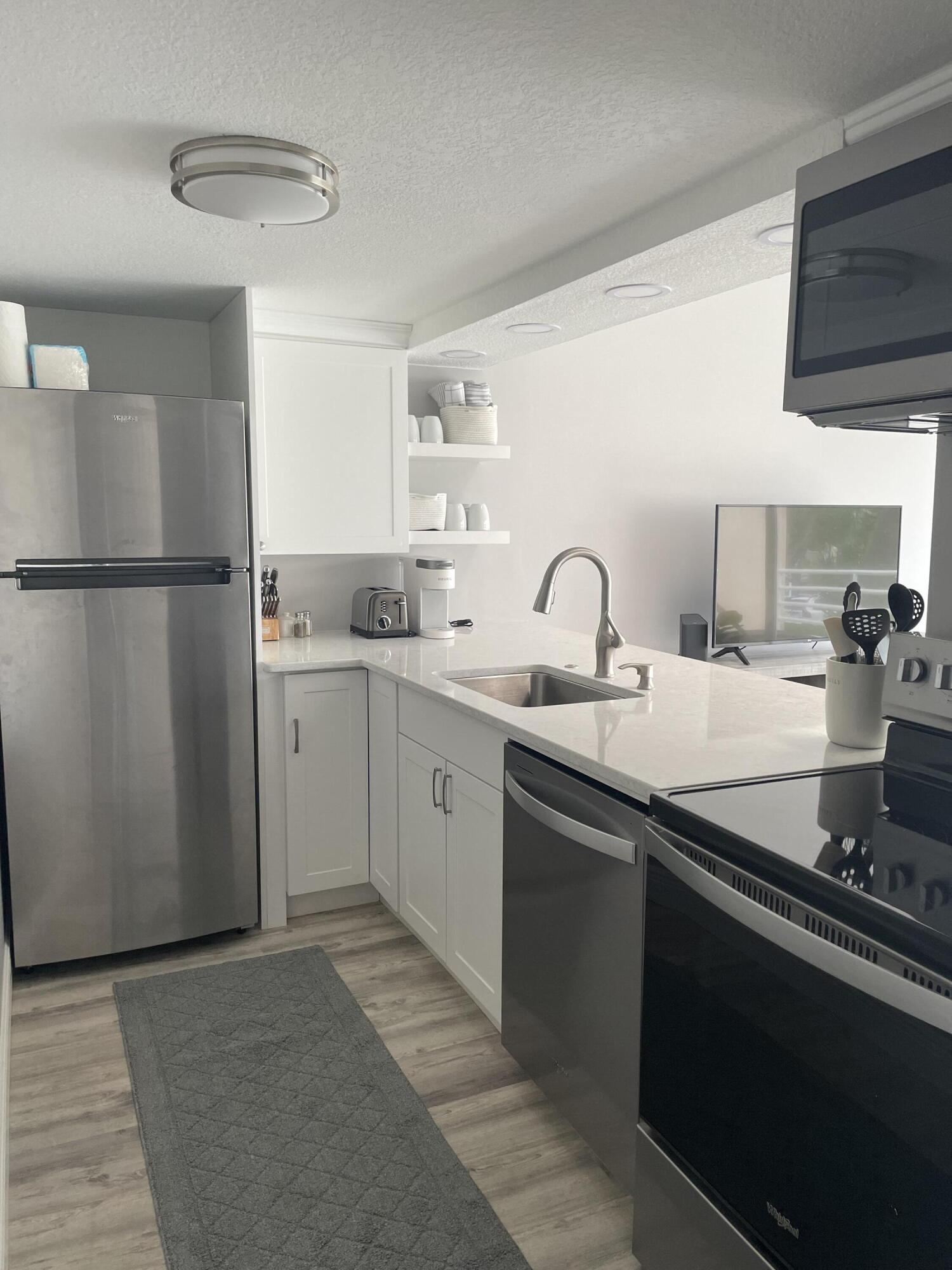 1605 Highway 1, Unit 209M2 Jupiter, FL 33477 - Photo 3 of 24 IMG_0910