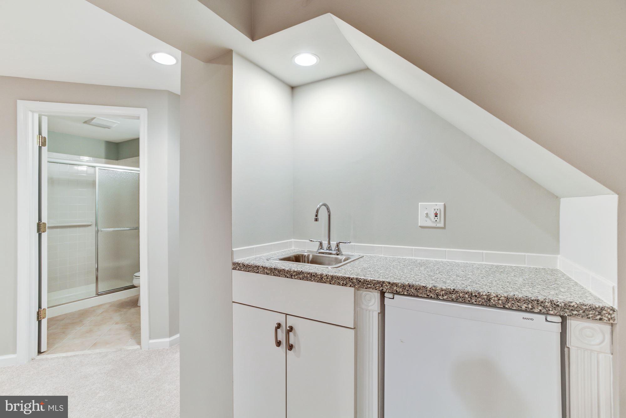 6420 Ripe Apple Lane Columbia, MD 21044 - Photo 18 of 26 Lower level wet bar
