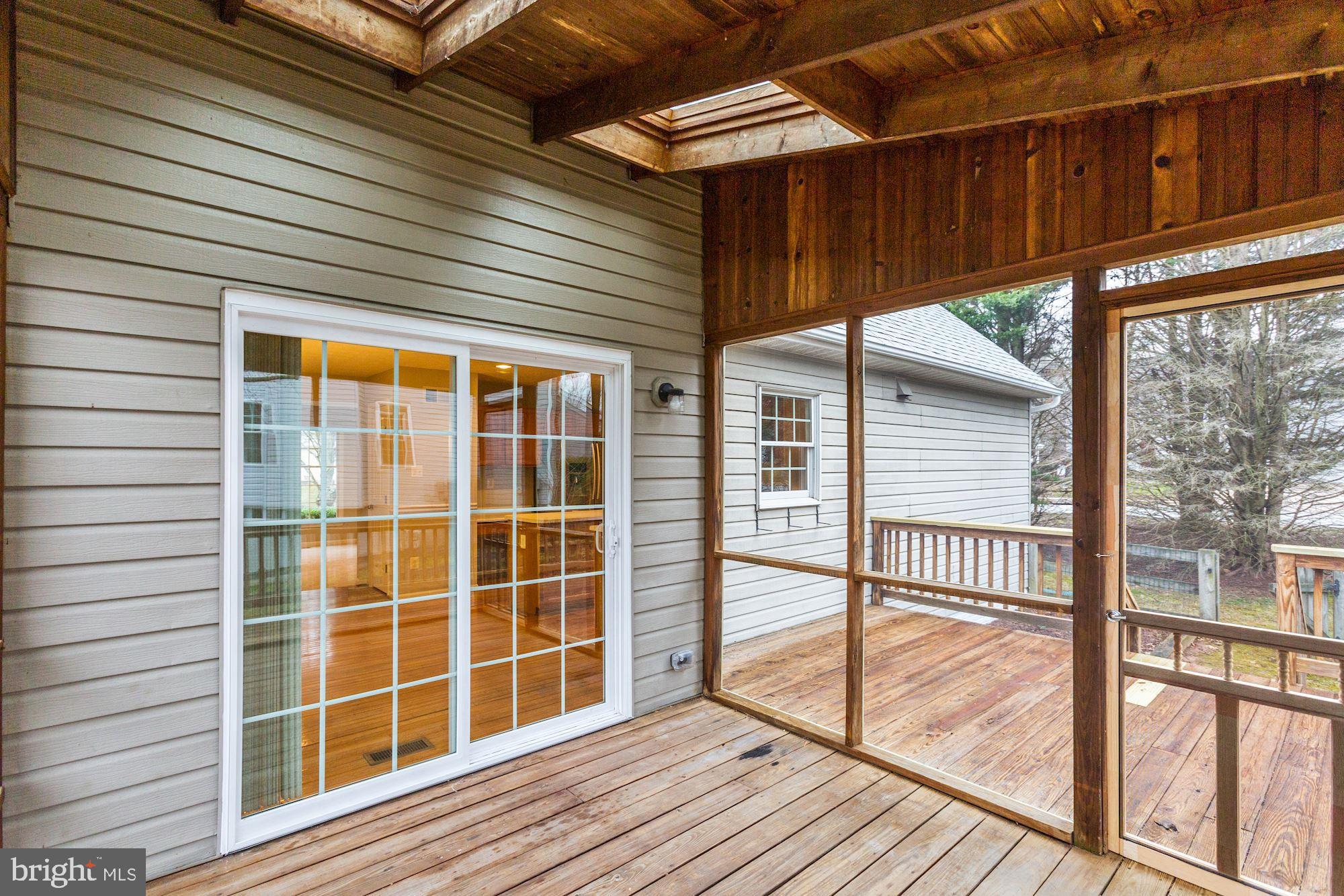 6420 Ripe Apple Lane Columbia, MD 21044 - Photo 23 of 26 Screened in porch off of the breakfast area
