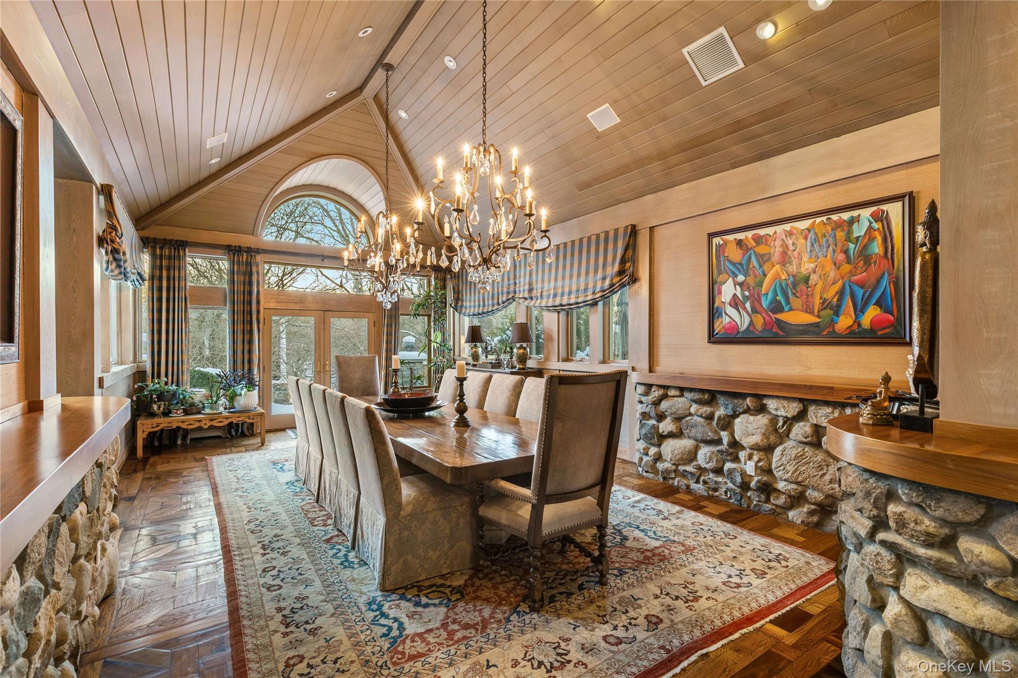 150 Old Farm Road North Chappaqua, NY 10514 - Photo 15 of 44 a view of a dining room with furniture a chandelier and wooden floor