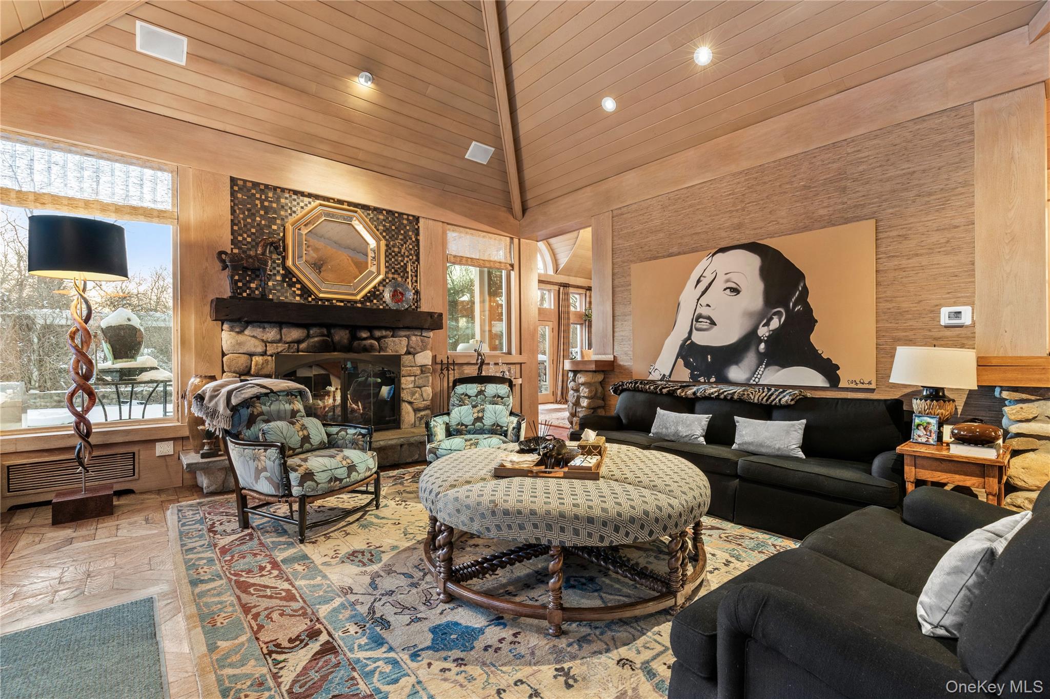 150 Old Farm Road North Chappaqua, NY 10514 - Photo 16 of 44 a living room with furniture a fireplace and a flat screen tv