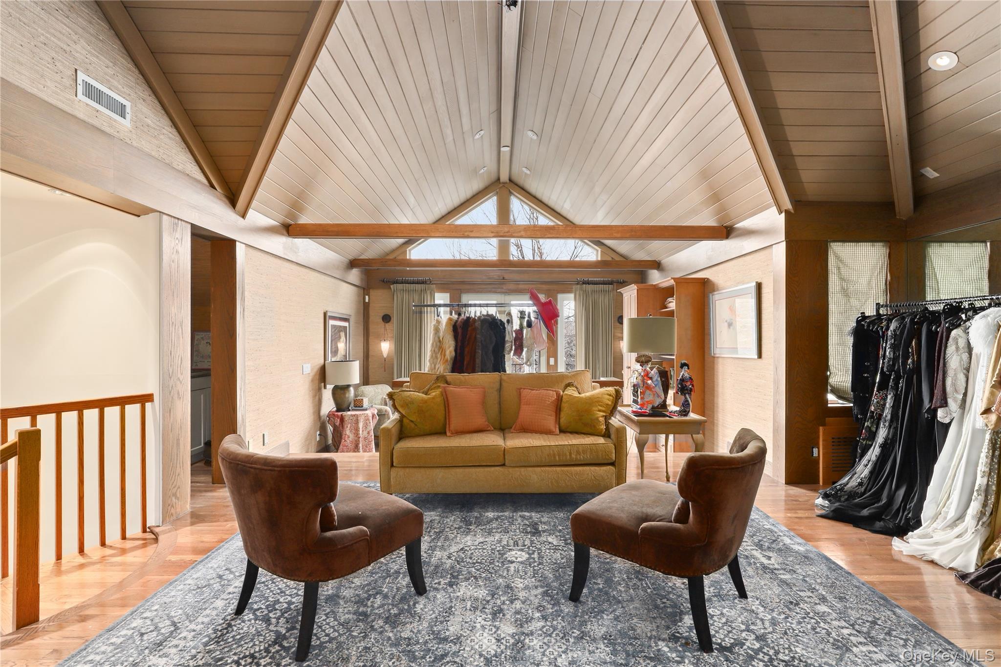 150 Old Farm Road North Chappaqua, NY 10514 - Photo 27 of 44 a living room with furniture and a large window