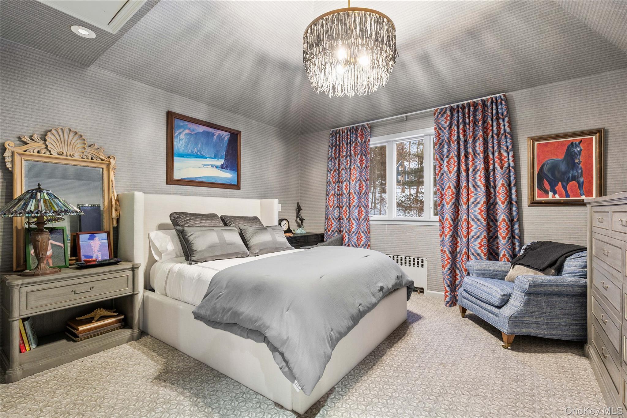 150 Old Farm Road North Chappaqua, NY 10514 - Photo 30 of 44 a spacious bedroom with a bed and a chandelier