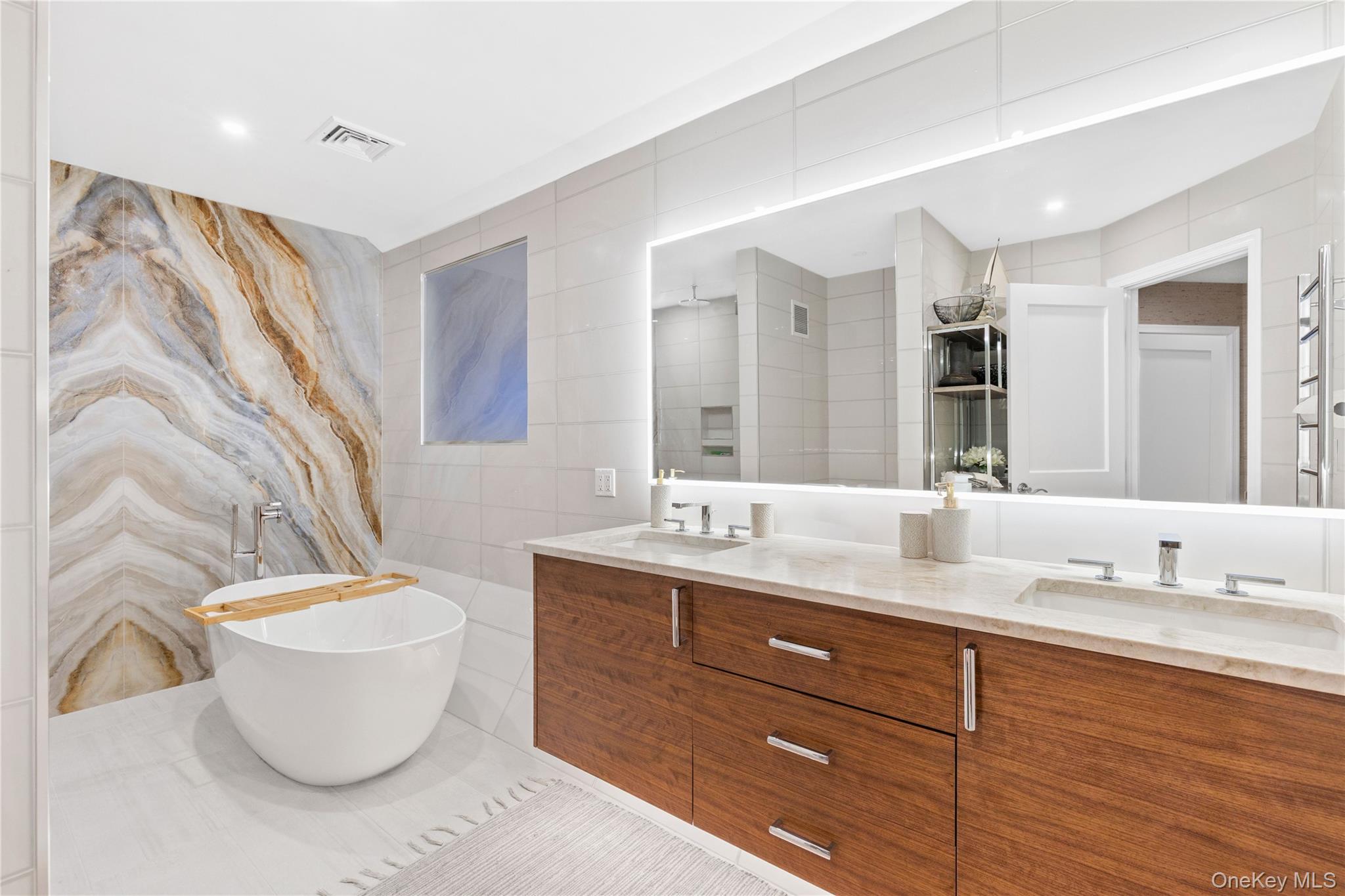 150 Old Farm Road North Chappaqua, NY 10514 - Photo 32 of 44 a bathroom with a granite countertop sink and a mirror