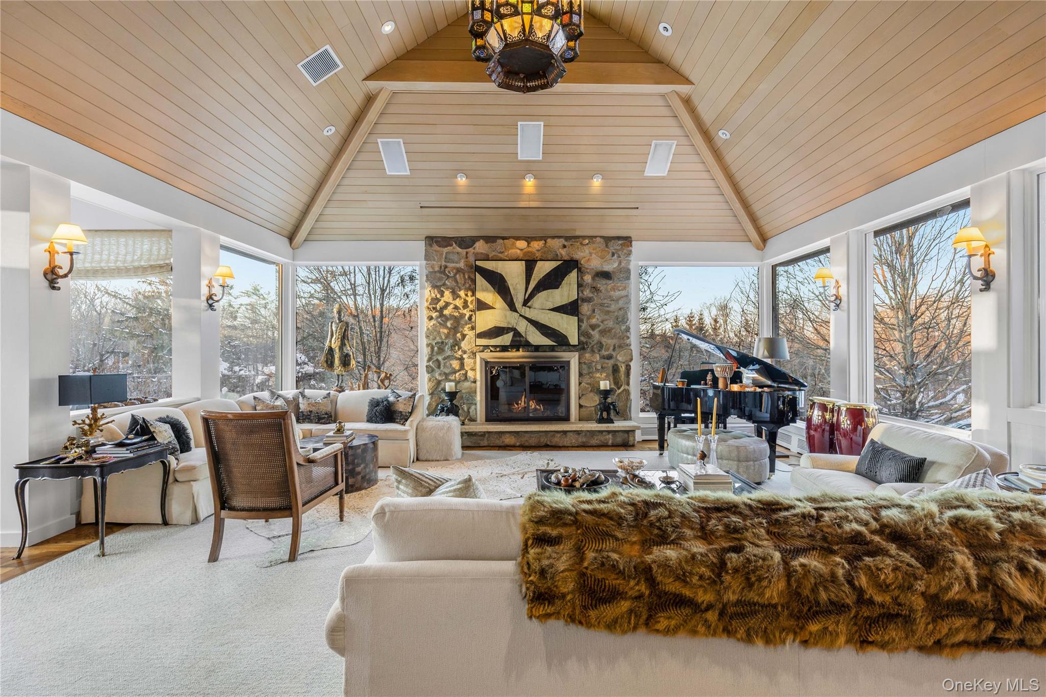 150 Old Farm Road North Chappaqua, NY 10514 - Photo 10 of 44 a living room with furniture fireplace and large windows