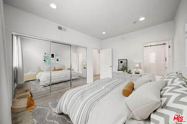 a bedroom with furniture and a couch