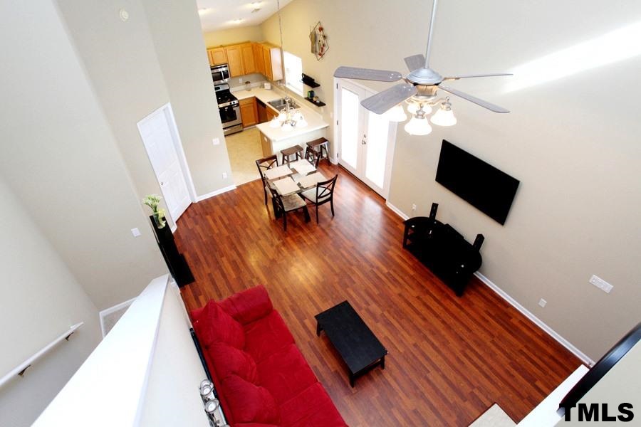 5416 Golden Moss Trail Raleigh, NC 27613 - Photo 14 of 25 As you tour to the Upstairs, You can View the Downstairs Wonderful Features. The 2-Story Soaring Ceilings Give the Home an Enormous Feel and Openess!