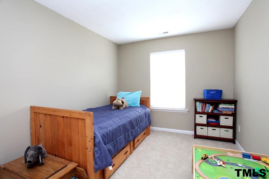 5416 Golden Moss Trail Raleigh, NC 27613 - Photo 15 of 25 The Bedrooms are Charming with Windows for Natural Light and Great Closet Size! Plenty of Wall Space for Furniture Needs.