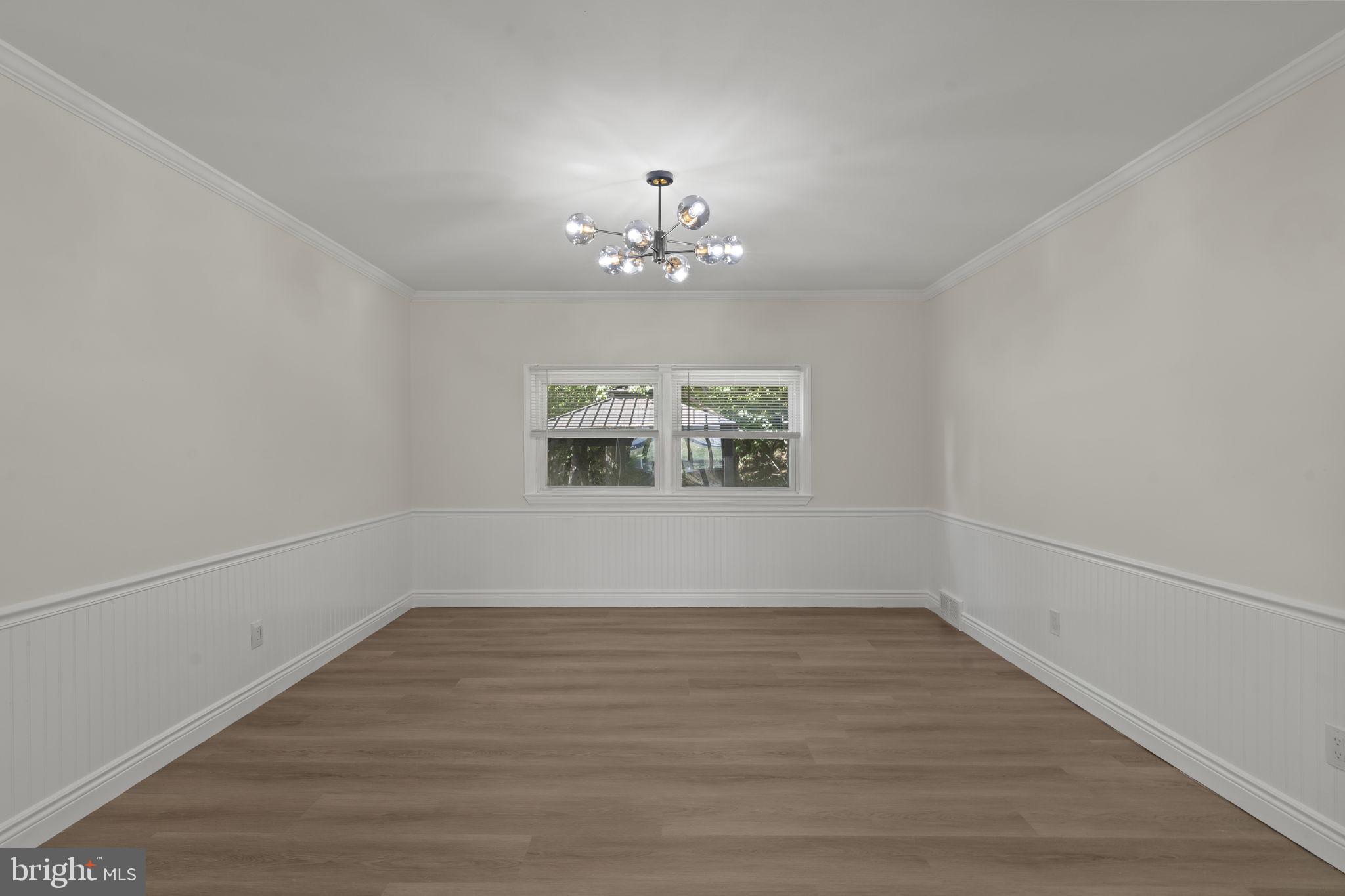 220 Glendale Road Havertown, PA 19083 - Photo 7 of 29 wooden floor in an empty room with a window