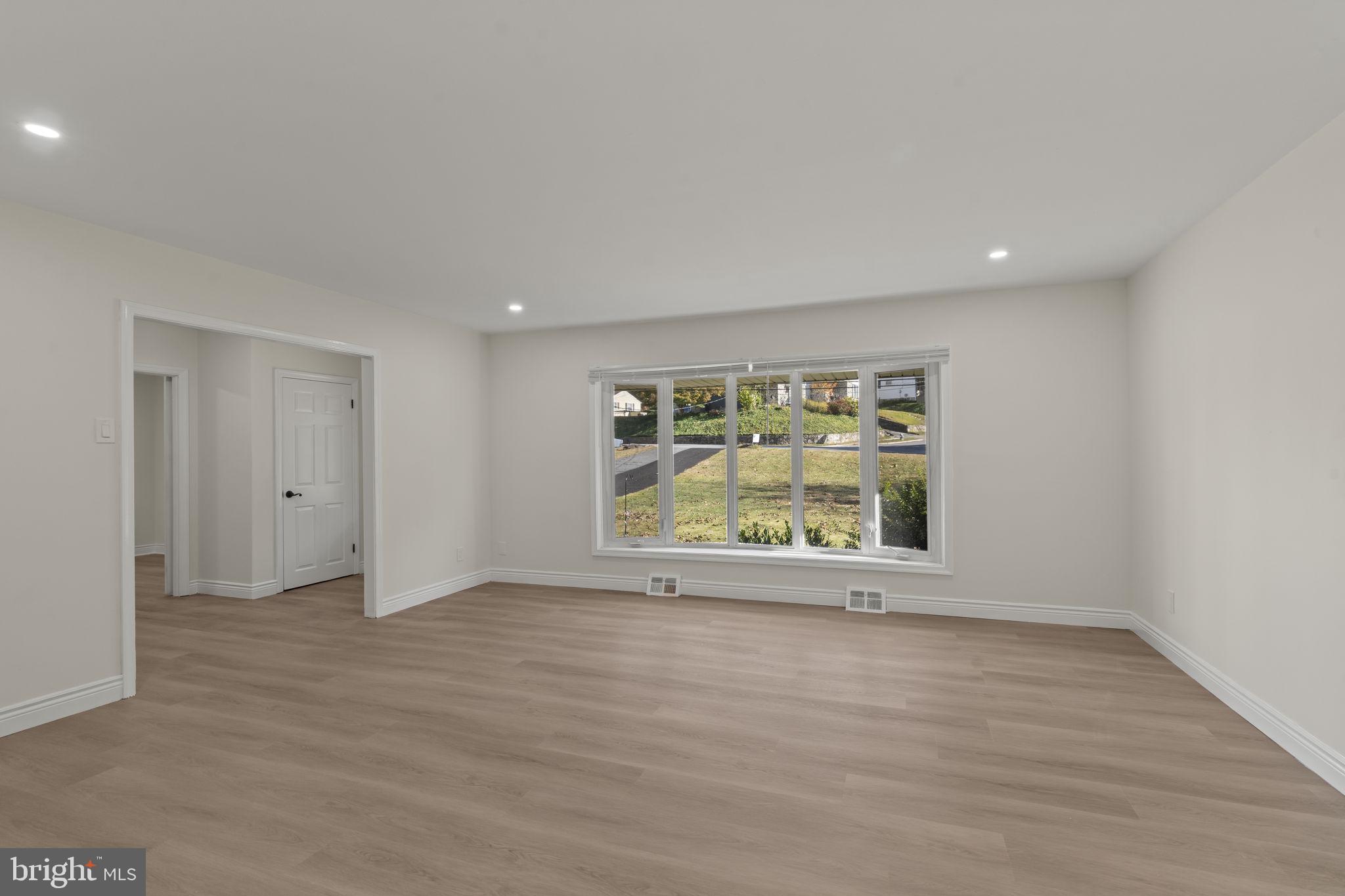 220 Glendale Road Havertown, PA 19083 - Photo 10 of 29 a view of an empty room with a window