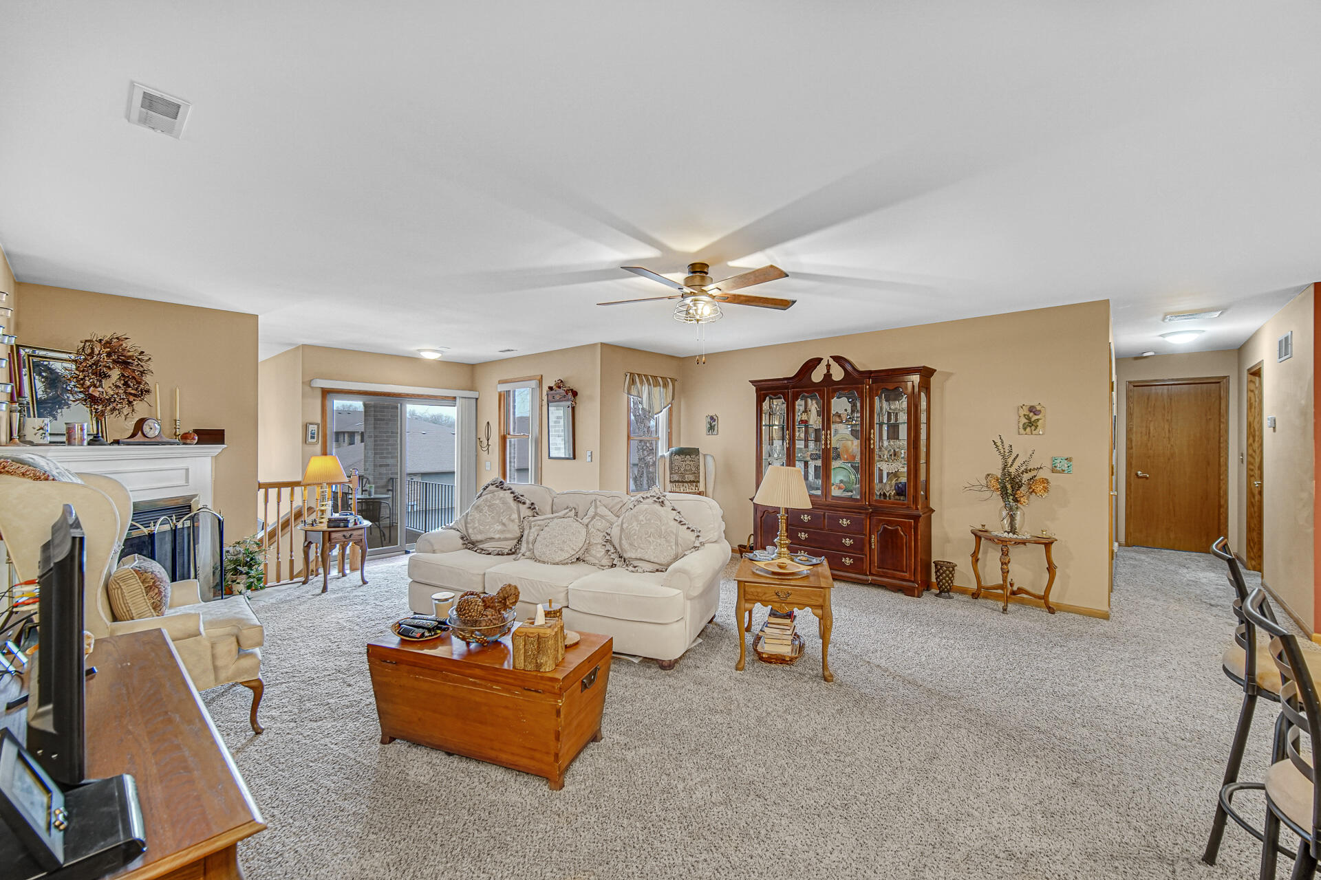947 Oak Drive Crown Point, IN 46307 - Photo 5 of 23 a living room with furniture and a flat screen tv
