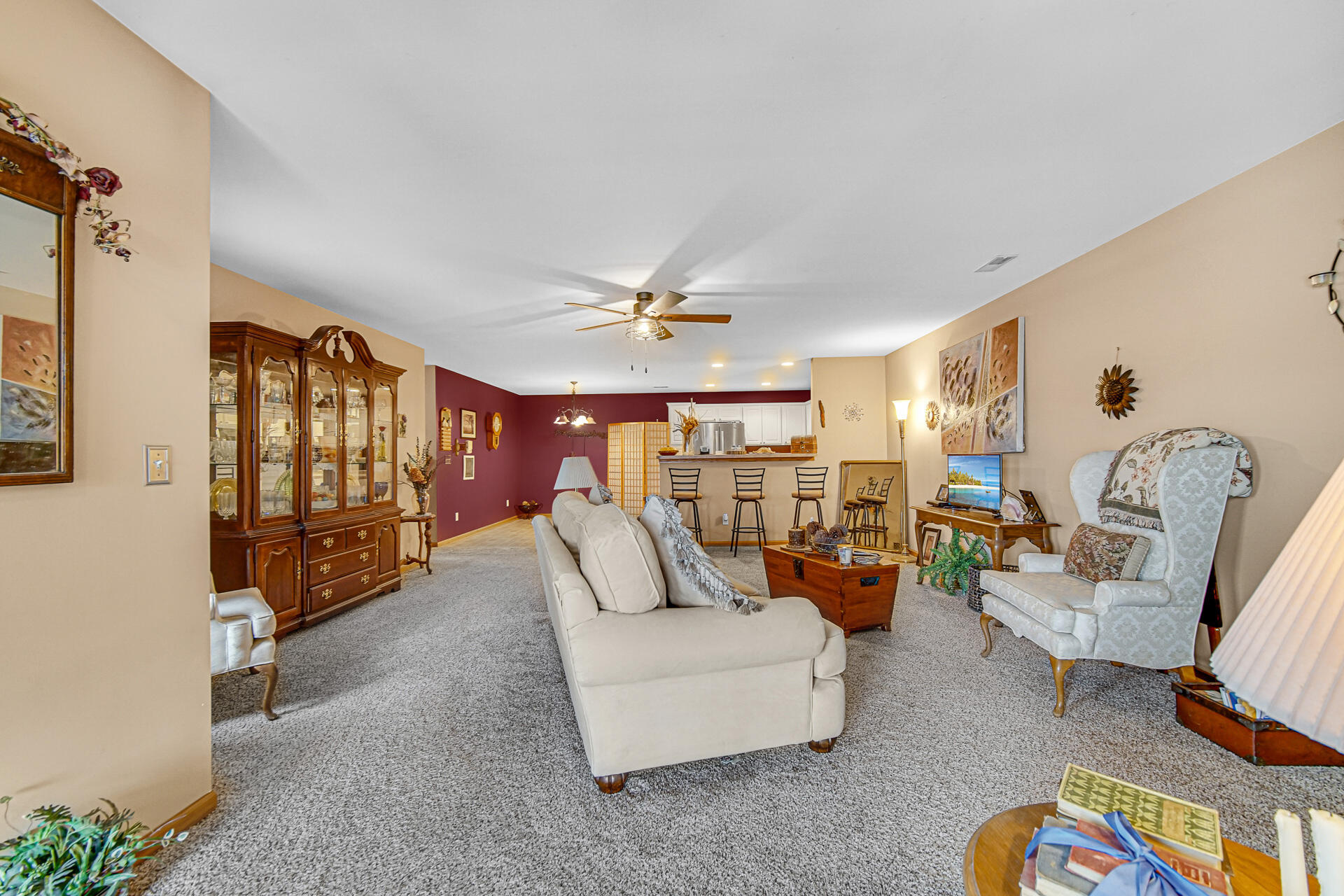 947 Oak Drive Crown Point, IN 46307 - Photo 7 of 23 a living room with furniture and a chandelier