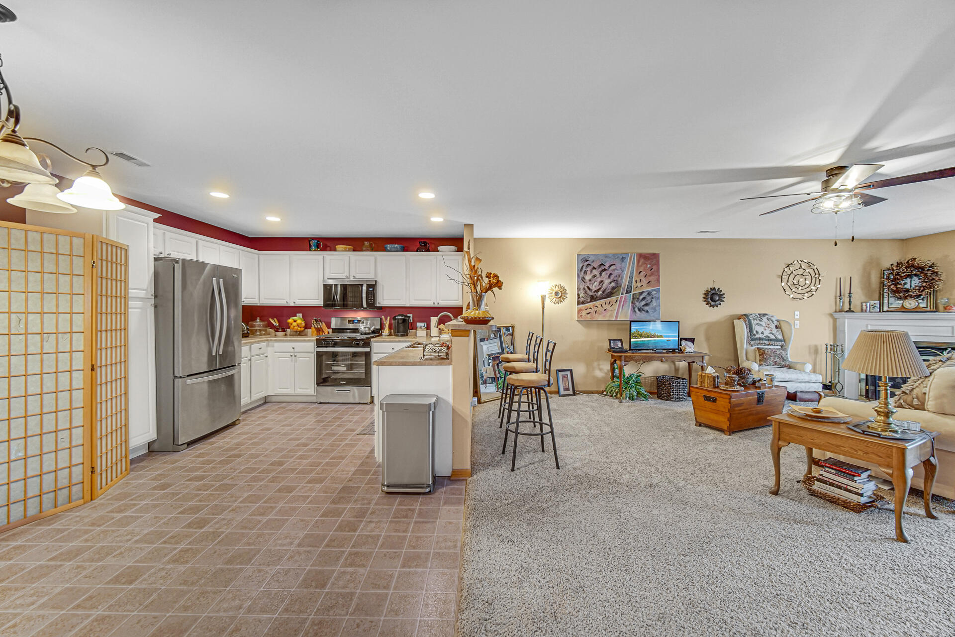 947 Oak Drive Crown Point, IN 46307 - Photo 8 of 23 a room with furniture and a kitchen view