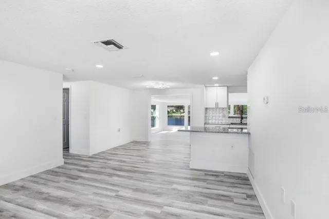 a view of a lake with sitting area