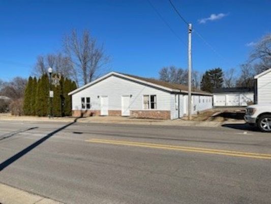 a view of a house with a street