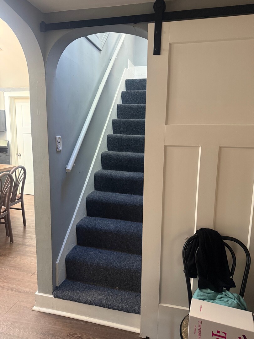10-12 South Somonauk Road Cortland, IL 60112 - Photo 20 of 29 a view of entryway and hall with wooden floor