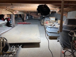 10-12 South Somonauk Road Cortland, IL 60112 - Photo 8 of 29 a room with lots of storage and utility