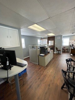 10-12 South Somonauk Road Cortland, IL 60112 - Photo 10 of 29 a living room with furniture and kitchen view