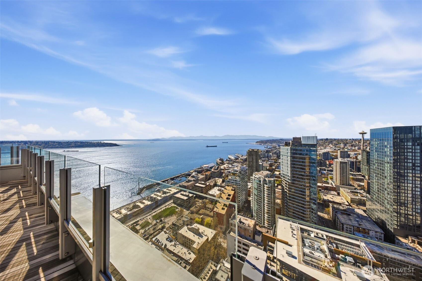 121 Stewart Street, Unit 1803 Seattle, WA 98101 - Photo 17 of 28 a view of city with ocean