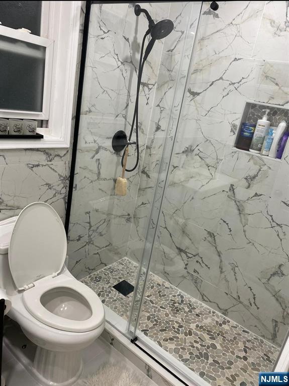 62 Frederick Street, Unit 1 Hackensack, NJ 07601 - Photo 17 of 18 a bathroom with a toilet and a sink